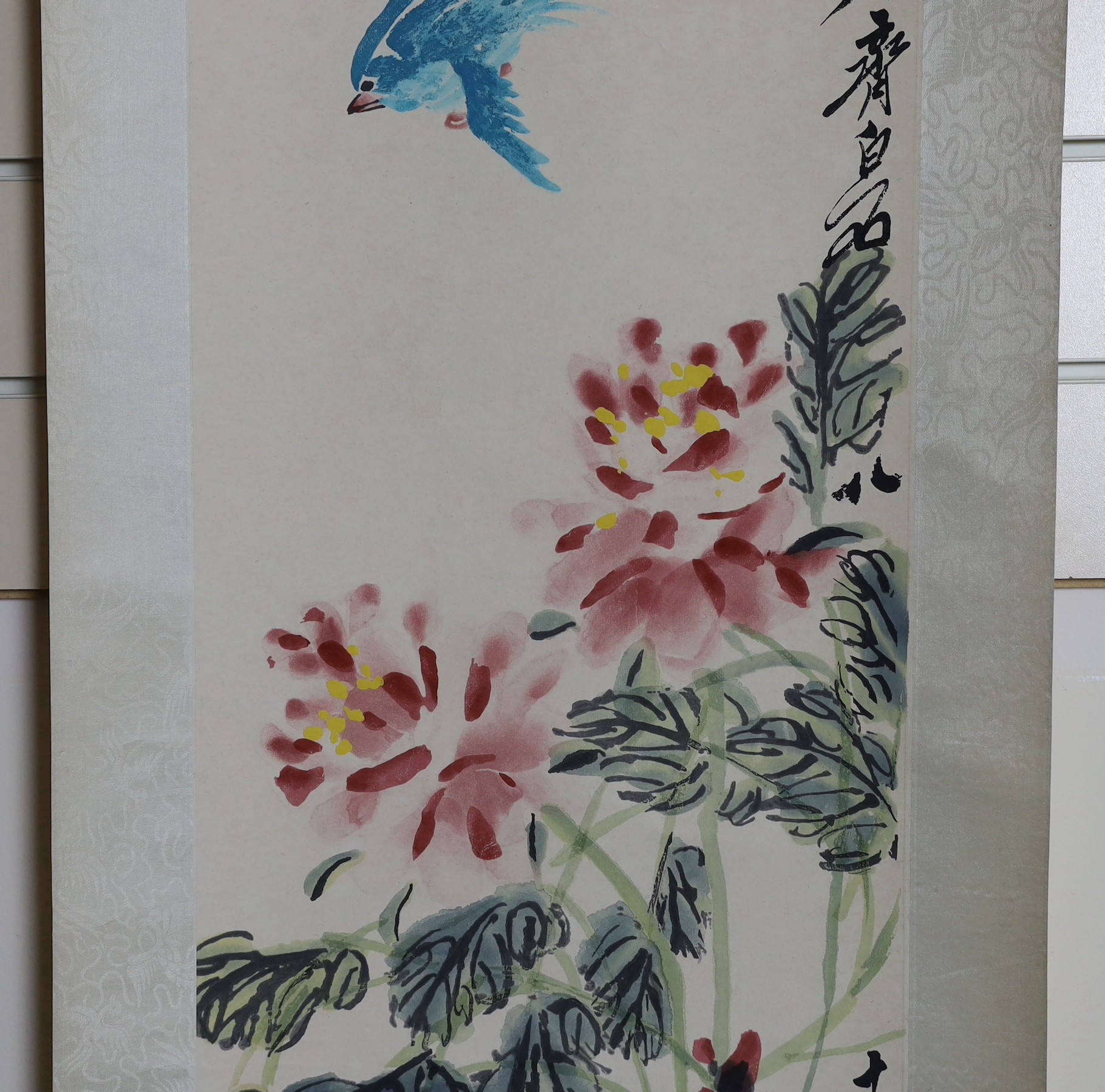 After Qi Baishi (1863-1957), Ribbon peonies, scroll picture , published by Tianjin Arts & Crafts Export Company, 1959, image 104cm x 33cm